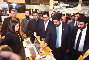 Consul General of China in Karachi Yang Yundong, Consul General of the United Arab Emirates in Karachi Bakheet Ateeq AlRemeithi and Governor of Sindh Kamran Khan Tessori perform the inauguration by cutting ribbon at PropTech Convention & BuildAsia Expo at the Karachi Expo Center
