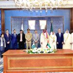 Caretaker Prime Minister Anwaar-ul-Haq Kakar, First Deputy Prime Minister and Minister for Interior of Kuwait, Sheikh Talal Al-Khaled Al-Ahmad Al-Sabah, Pakistan's Chief of the Army Staff General Syed Asim Munir and Pakistani delegation in a group photo after the signing of MoUs of cooperation between Pakistan and Kuwait.