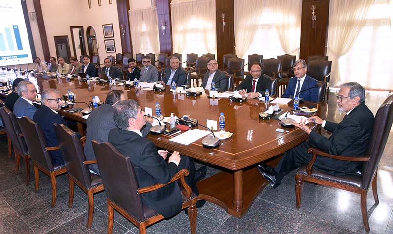 Caretaker Sindh Chief Minister Justice (R) Maqbool Baqar presides over a meeting of the health department at CM House