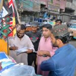 Police personnel checking NADRA identity cards of foreign migrants in different areas