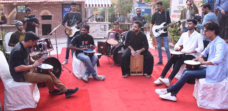 Artists presenting Drum Circle during the opening ceremony of the 4 days 16th International Urdu Conference-2023 organizes by Arts Council of Pakistan Karachi