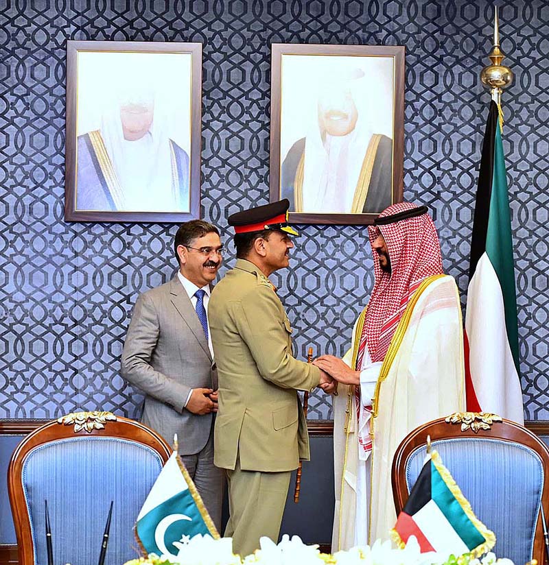 First Deputy Prime Minister and Minister of Interior of Kuwait Sheikh Talal Al-Khaled Al-Ahmad Al-Sabah shaking hands with Chief of the Army Staff of Pakistan General Syed Asim Munir while Caretaker Prime Minister Anwaar-ul-Haq Kakar looks on
