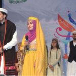Artists performing on the stage during Cultural Show of Gilgit-Baltistan in collaboration with Al-Hamra and Pakiza Arts Council
