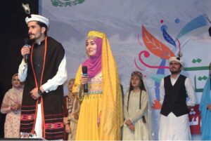 Artists performing on the stage during Cultural Show of Gilgit-Baltistan in collaboration with Al-Hamra and Pakiza Arts Council