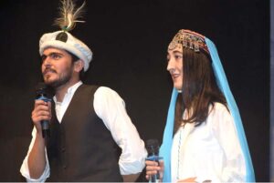 Artists performing on the stage during Cultural Show of Gilgit-Baltistan in collaboration with Al-Hamra and Pakiza Arts Council