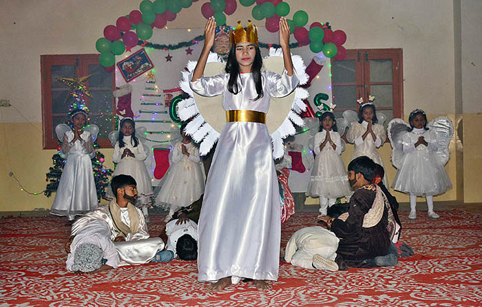 APP01-201223Hyderabad Students performing tableau on the stage during Christmas program in connection with upcoming Christmas at local church.