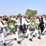 President Dr. Arif Alvi receiving guard of honor during his visit to Mazar-i-Quaid.