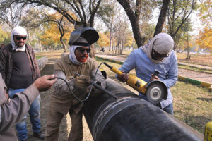 SNGPL staffers busy welding gas pipeline during installation at G-7 area in the Federal Capital. 