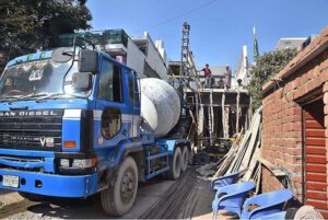 Labourers busy in construction work of a home at G-7 in Federal Capital