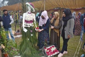 Visitors keenly viewing flowers during Chrysanthemum, Marigold & Autumn Flowers Show-2023 arranged by the Institute of Horticulture Sciences, University of Agriculture Faisalabad (UAF)