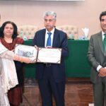 Caretaker Federal Minister for Information, Broadcasting and Parliamentary Affairs, Murtaza Solangi giving away certificates to the graduates during the graduation ceremony of 38th MCMC Domain Specific Training and 40th Specialized Training Program at Information Service Academy Auditorium.