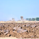 Heavy machinery being used to build Chak Beli Link Road in the outskirts of the city