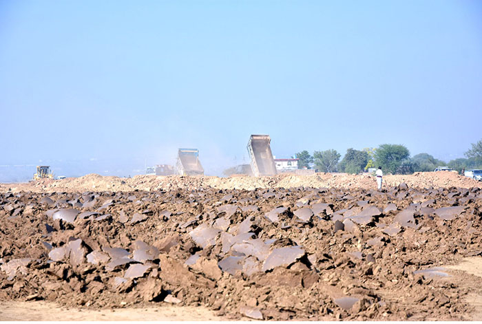 Heavy machinery being used to build Chak Beli Link Road in the outskirts of the city
