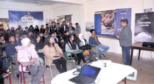 Students taking part in a lecture session on Bio Diversity in Margalla Hills Park organized by the Devcom-Pakistan in connection with the 13th Pakistan Mountain Festival