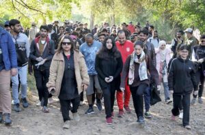 Students taking part in a lecture session on Bio Diversity in Margalla Hills Park organized by the Devcom-Pakistan in connection with the 13th Pakistan Mountain Festival