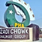 Labourers busy in renovation work at Azadi Chowk