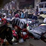 A view of hand carts on the road creating problems for pedestrians in violation of encroachment on Double Road at Shamsabad.