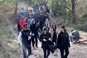 Students taking part in a lecture session on Bio Diversity in Margalla Hills Park organized by the Devcom-Pakistan in connection with the 13th Pakistan Mountain Festival
