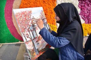 Students participating in painting competition during Chrysanthemum, Marigold & Autumn Flowers Show-2023 arranged by the Institute of Horticulture Sciences, University of Agriculture Faisalabad (UAF)