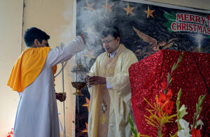 Christian community members performing religious rituals on Christmas day at Fatima Church.