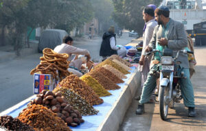 Vendor is displaying and selling dry fruit at General Bus Stand road.