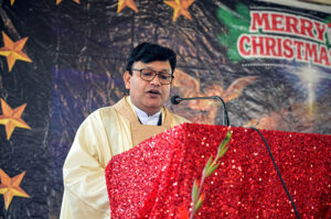 Christian community members performing religious rituals on Christmas day at Fatima Church.