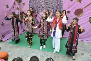 Students performing in tableau during culture program at RC School