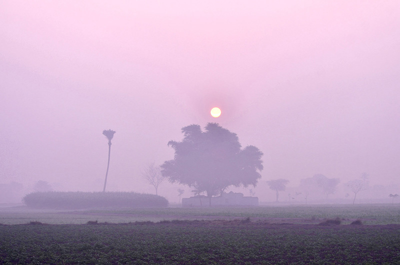 A beautiful view of sunrise over the sky in the the City