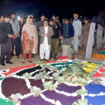 Divisional Commissioner Silwat Saeed is visiting stalls after inaugurating three days winter festival organized by the Parks and Horticultural Authority at Bagh-E-Jinnah Park on late Friday night