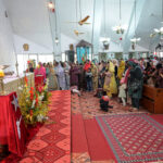 Christian community members performing religious rituals on Christmas day at Fatima Church.