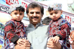 A Large number of people participating in a rally during the celebrations of Sindhi Ajrak Topi Culture Day at Jinnah Bagh Chowk