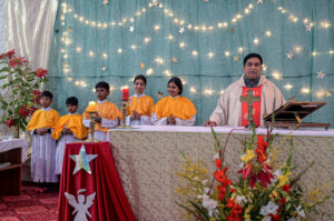 Christian community members performing religious rituals on Christmas day at Fatima Church.