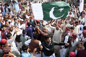 A Large number of people participating in a rally during the celebrations of Sindhi Ajrak Topi Culture Day at Jinnah Bagh Chowk