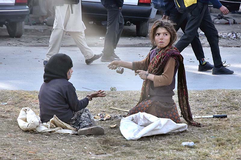 Gypsy girls playing on Greenbelt of G-7 in the Federal Capital