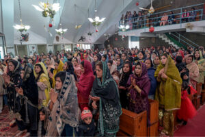 Christian community members performing religious rituals on Christmas day at Fatima Church.