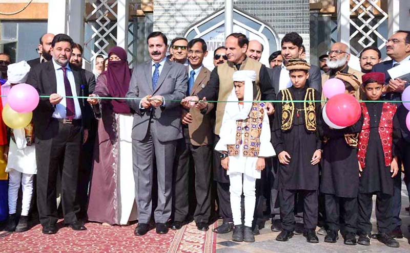 Managing Director Pakistan Bait-ul-Mal, Amir Fida Paracha cutting ribbon to inaugurate Pakistan Bait-ul-Mal event "PBM at Glance" at F-9 Park