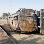A view of a burnt oil tanker which overturned at the Airport Road on late Wednesday night