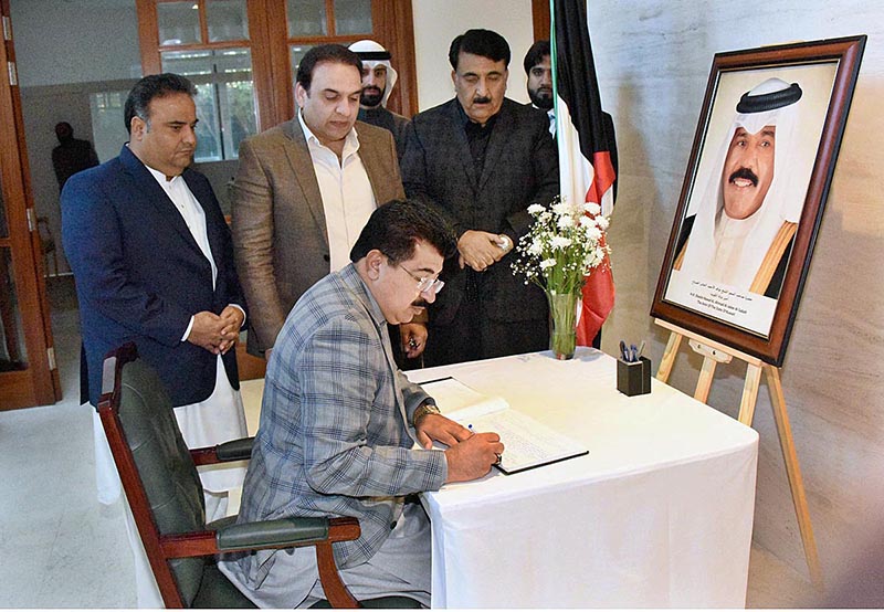 Chairman Senate, Muhammad Sadiq Sanjrani recording his condolence on the demise of AMIR of Kuwait Sheikh Nawaf Al-Ahmad Al-Jaber Al-Sabah in the visitor’s book at Embassy of Kuwait