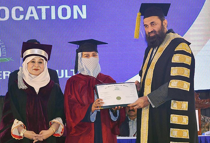 Governor Punjab Muhammad Baligh ur Rehman awarding degrees among the successful students during 6th Convocation of Women University Mattital Campus