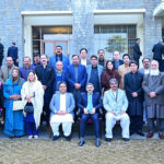 Caretaker Prime Minister in group photo with the Prime Minister and Cabinet members of Azad Jammu and Kashmir.