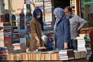 People busy in selecting and purchasing old books from roadside setup in Provincial Capital