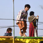 Children enjoying jump on trampoline at Bangal Dearo