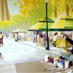 Artist busy in making wall paintings in front of the MM Alam Road