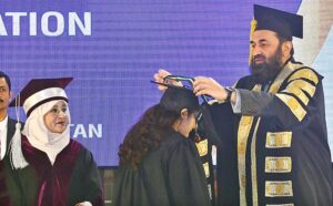 Governor Punjab Muhammad Baligh ur Rehman awarding gold medal among the position holder students during 6th Convocation of Women University Mattital Campus
