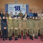 A group photo of Chief Traffic Officer (CTO) Faisalabad Maqsood Ahmad Lone along with Prof Dr Zill-i-Huma Nazli Vice Chancellor (VC) Government College Women University Faisalabad (GCWUF) with other officials after distributing certificates among women police on their completion of WOW (Women on Wheels) training program