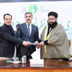 Caretaker Minister for National Health Services, Regulations & Coordination Dr. Nadeem Jan and Special Assistant to Prime Minister for Inter-Faith Harmony Maulana Tahir Ashrafi presenting Caretaker Prime Minister Anwaar-ul-Haq Kakar with the Islamabad Declaration Supporting Immunization and Polio Eradication at the conclusion of National Ulema Conference.