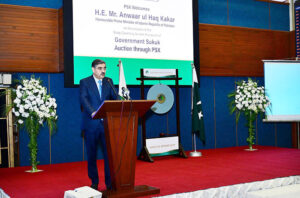 Caretaker Prime Minister Anwaar-ul-Haq Kakar addressing the Ceremony to mark the launch of Government Sukook Auction at Pakistan Stock Exchange