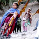 Children enjoy on swing at Ghazi Khan Khuhawar Village.