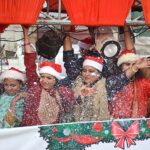 The female participants of a ‘Christmas Aman Rally’ waving their hands