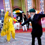 Sikh Yatri artists showcasing their talents during the International Punjabi Conference